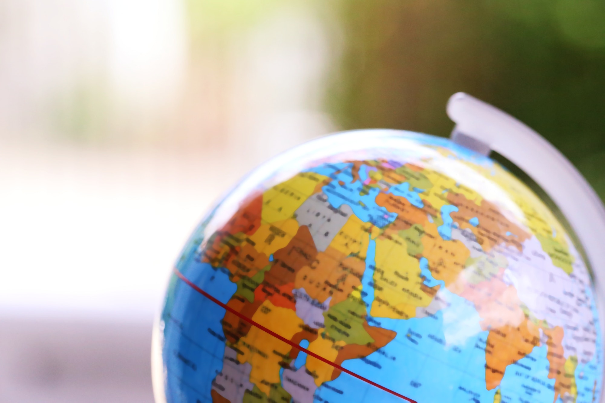 Closeup macro of global globe blur background