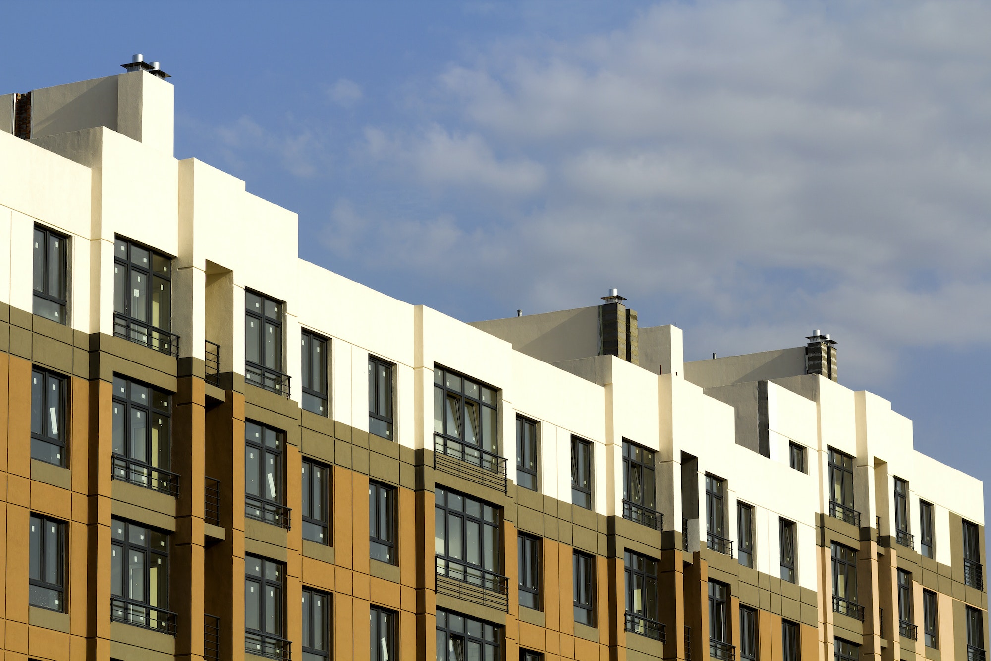 Condominium or modern apartment building with symmetrical architecture