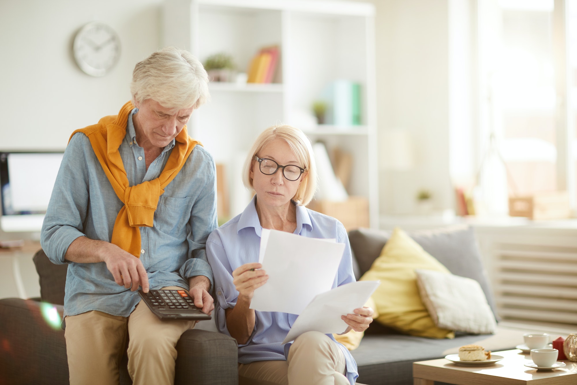 Senior Couple Calculating Taxes