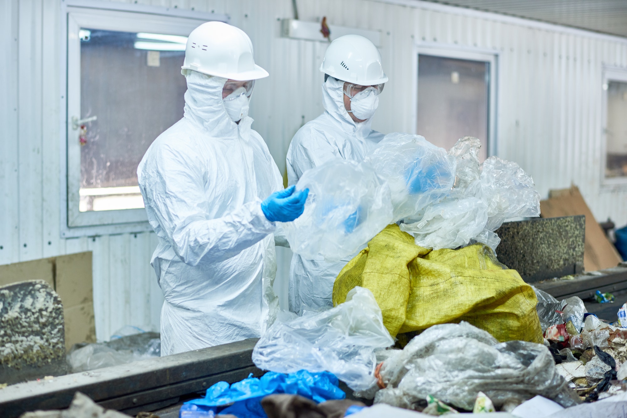 Workers on Waste Processing Plant