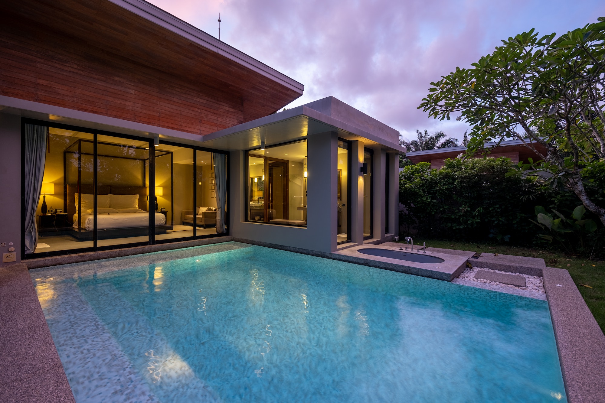 Modern house with a swimming pool, modern pool villa at the beach
